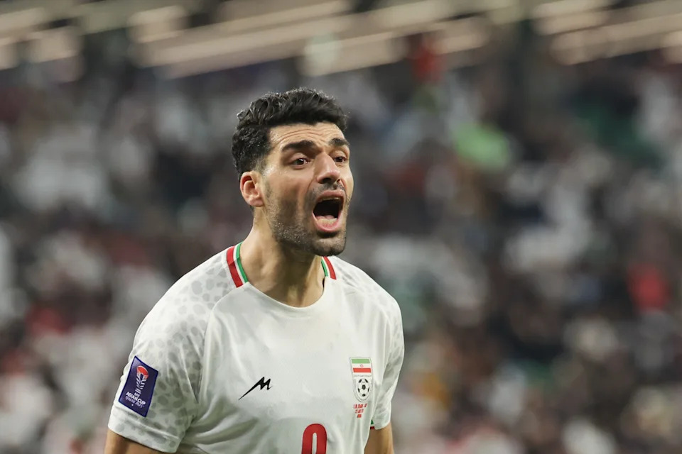 AL RAYYAN, QATAR - JANUARY 23: Mehdi Taremi of Iran celebrates scoring his team's second goal during the AFC Asian Cup Group C match between Iran and United Arab Emirates at Education City Stadium on January 23, 2024 in Al Rayyan, Qatar. (Photo by Lintao Zhang/Getty Images)