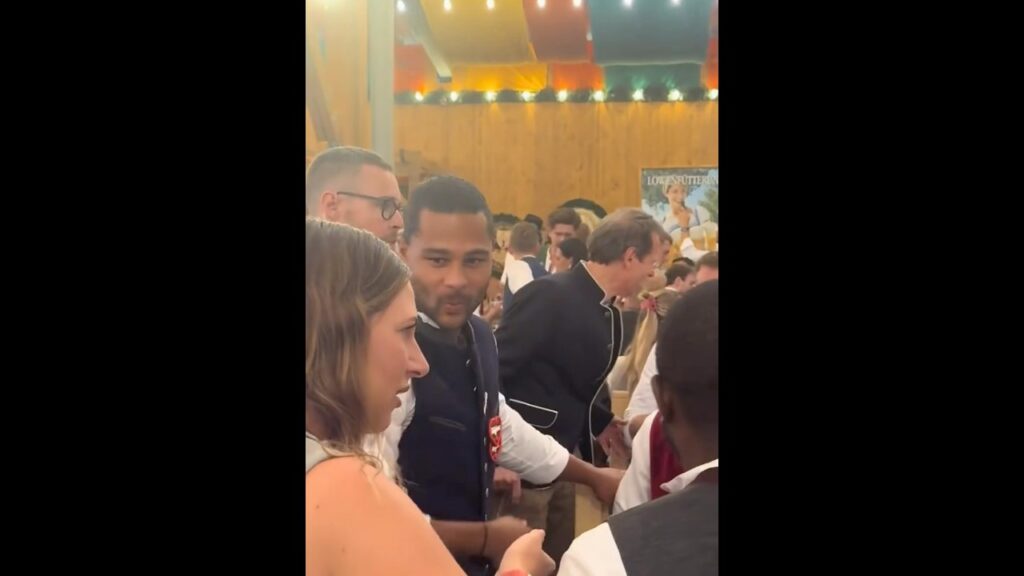 Serge Gnabry and Vincent Kompany at the Oktoberfest