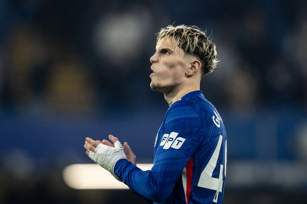 Alejandro Garnacho applauds Chelsea fans after a match at Stamford Bridge