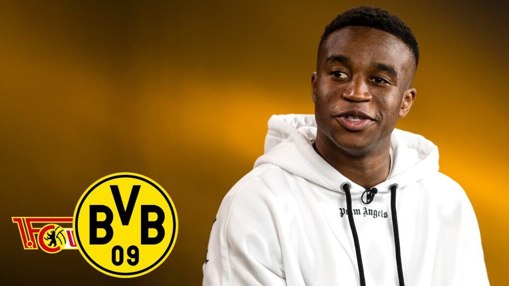Moukoko: “Schmelzer gave me motivation every day!” | Matchday Magazine | Union Berlin – BVB Moukoko: "Schmelzer gave me motivation every day!" | Matchday Magazine | Union Berlin - BVB