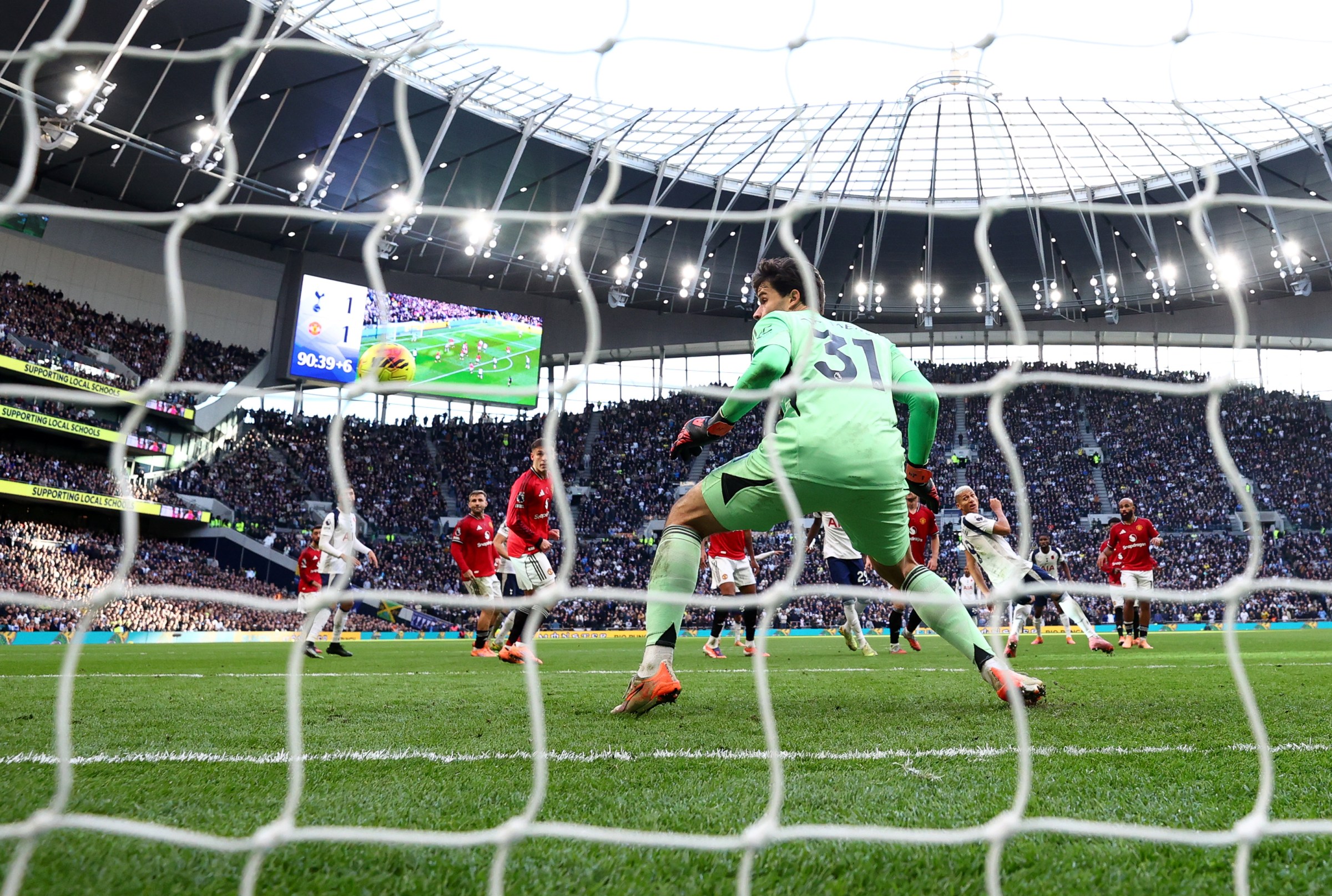 LONDON, ENGLAND - NOVEMBER 08: Senne Lammens of Manchester United looks on as Richarlison of Tottenham Hotspur scores his team’s second goal during the Premier League match between Tottenham Hotspur and Manchester United at the Tottenham Hotspur Stadium on November 08, 2025 in London, England. (Photo by Alex Pantling/Getty Images)
