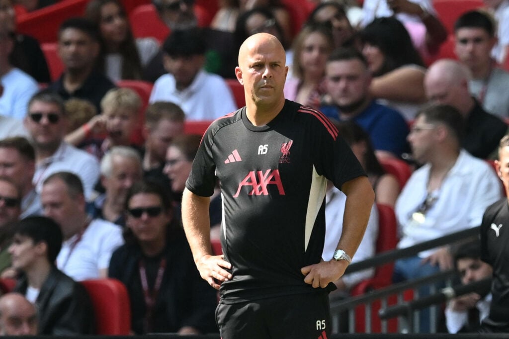 Arne Slot stood on the touchline.