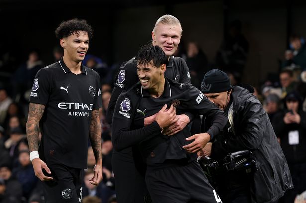 Tijjani Reijnders of Manchester City celebrates scoring his team's second goal with teammate Erling Haaland during the Premier League match between Fulham and Manchester City at Craven Cottage on December 02, 2025 in London, England. 