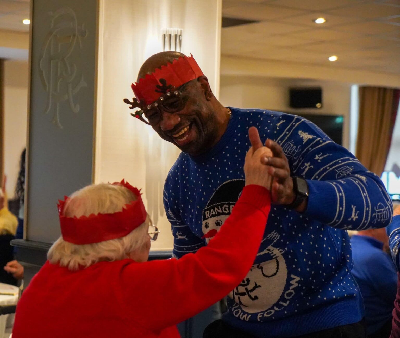 Big Marvin Andrews dancing away with an attendee at the Rangers Charity Foundation Christmas Lunch ♥️