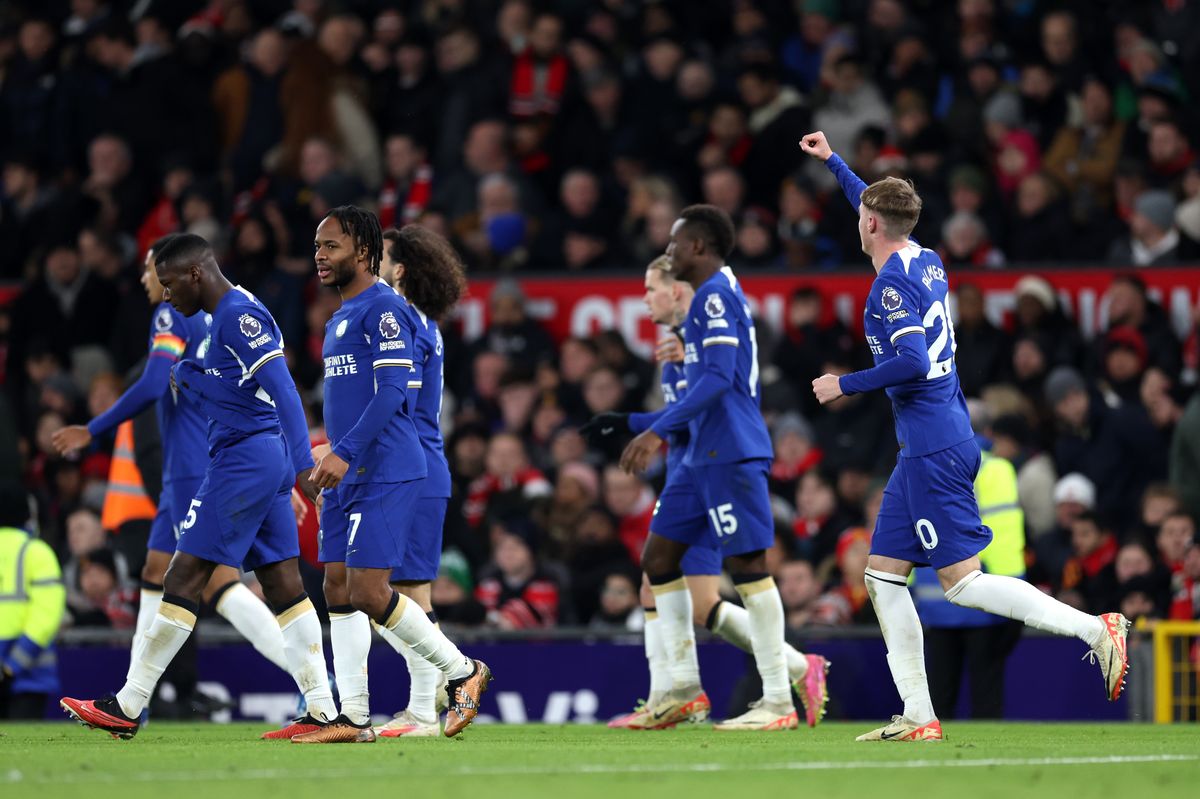 Cole Palmer celebrates scoring at Old Trafford