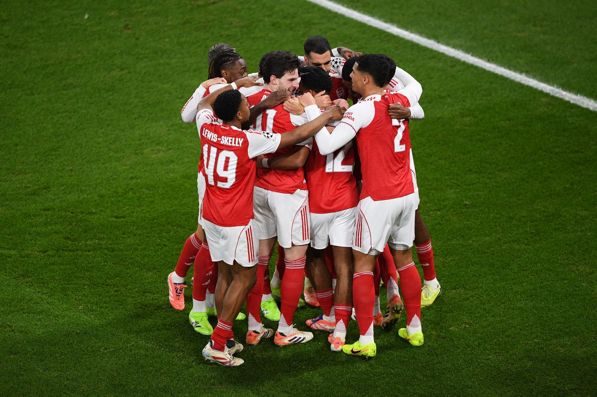 Jurrien Timber of Arsenal celebrates with teammates