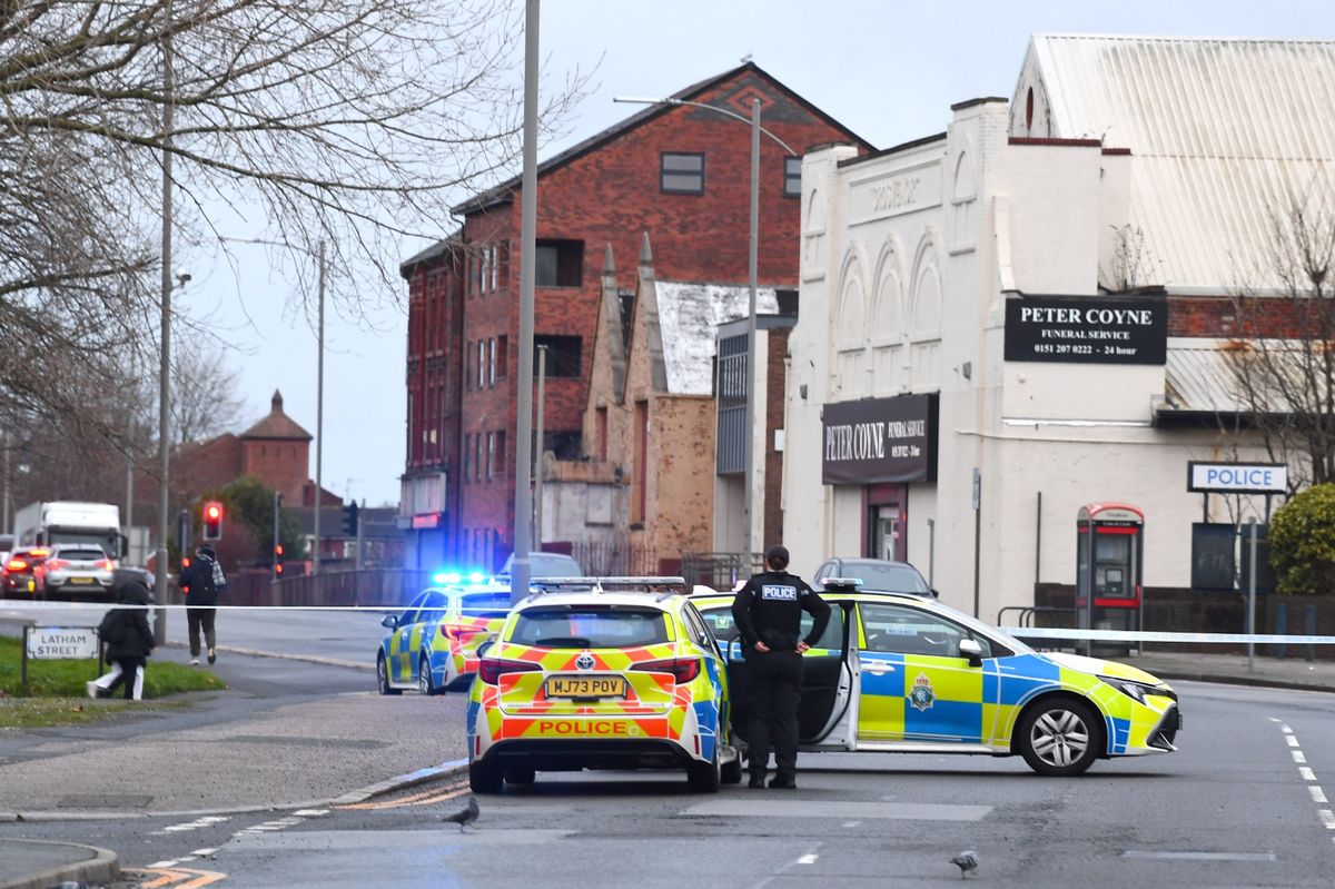 Police at the cordon near the junction of Latham Street, Kirkdale