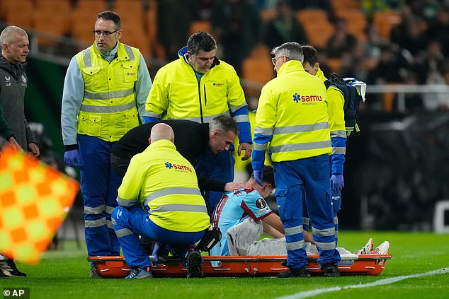 Robin van Persie comforted his son as he was taken off the pitch in the worst circumstances