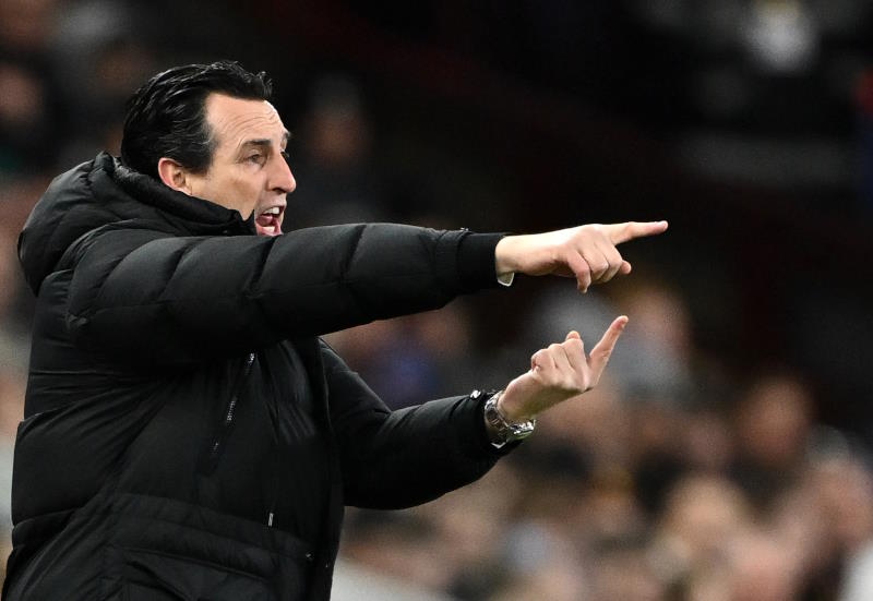 Aston Villa manager Unai Emery points during a game