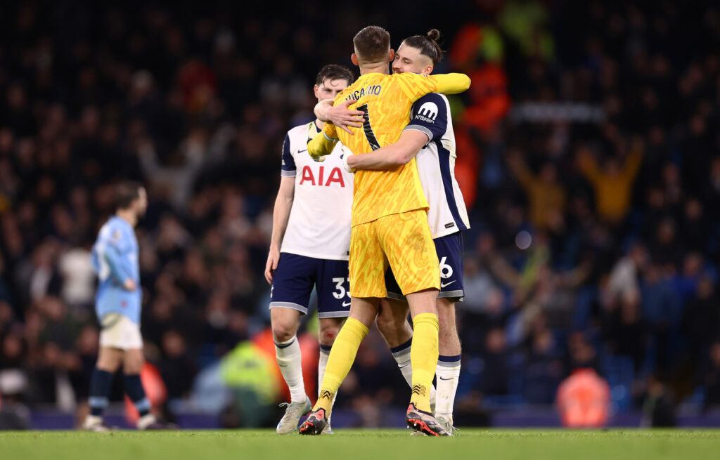 Italy goalkeeper Guglielmo Vicario and Radu Dragusin of Tottenham Hotspur celebrate victory following the Premier League match between Manchester City FC and Tottenham Hotspur FC at Etihad Stadium on November 23, 2024 in Manchester, England. (Photo by Naomi Baker/Getty Images) Milan transfer targets