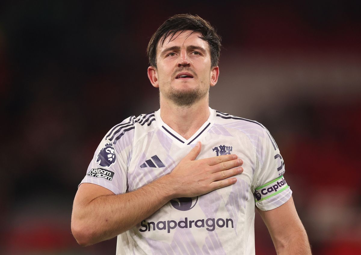 Harry Maguire of Manchester United celebrates victory following the Premier League match between Liverpool and Manchester United at Anfield