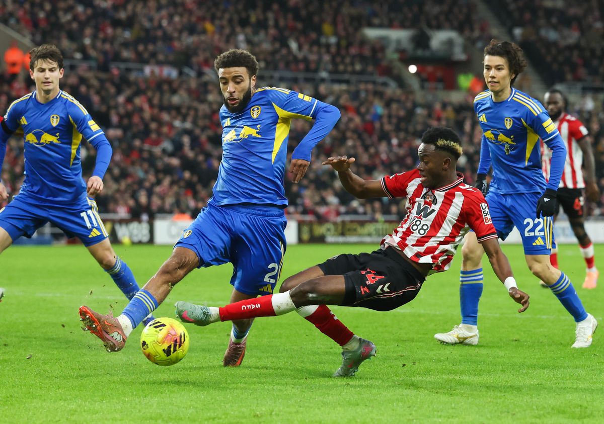 Jayden Bogle is tackled