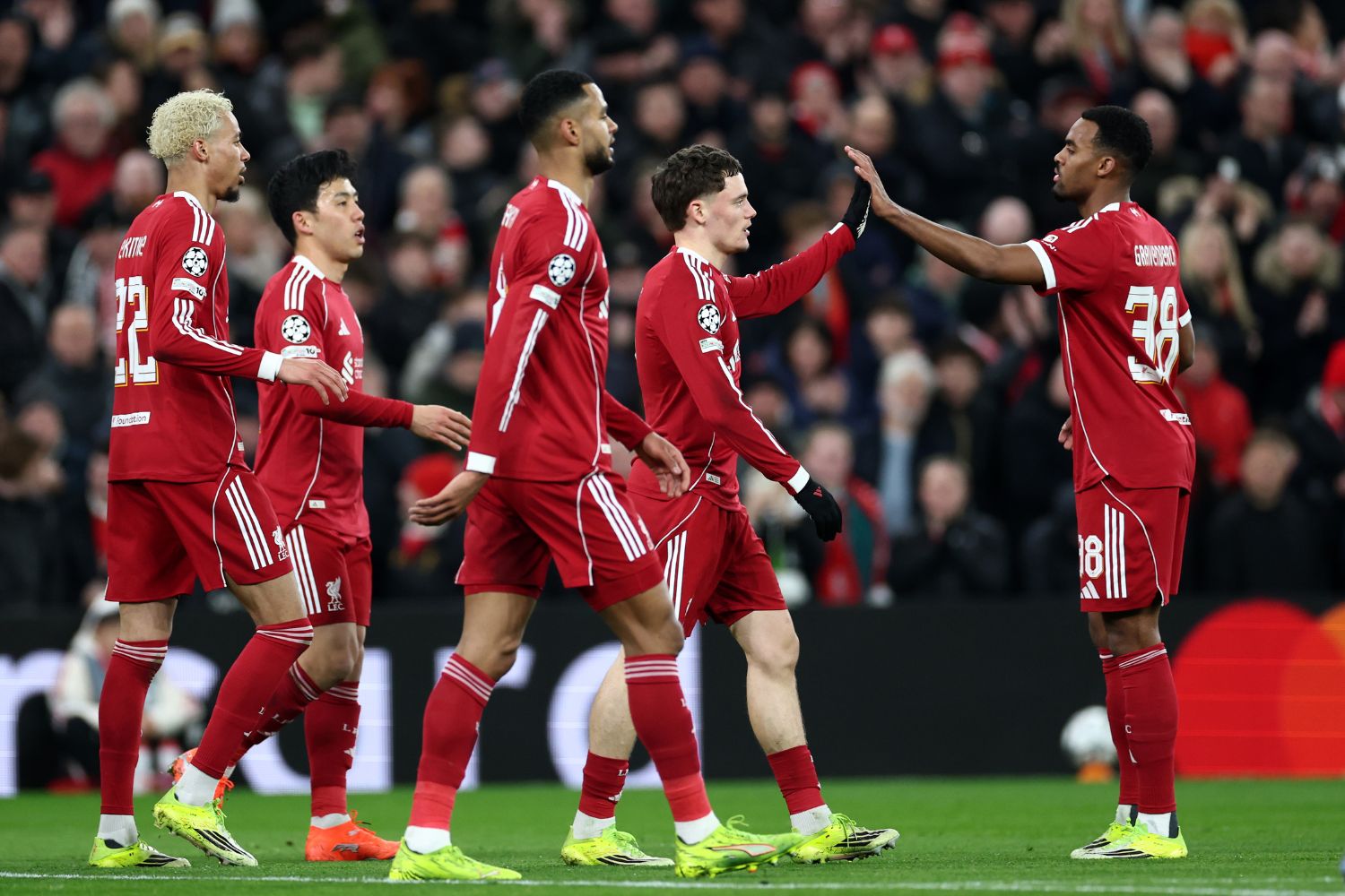 Wataru Endo celebrates with Liverpool teammates after Florian Wirtz scores against Qarabag
