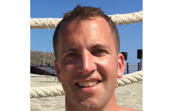 Woman finds husband’s body in woods behind school