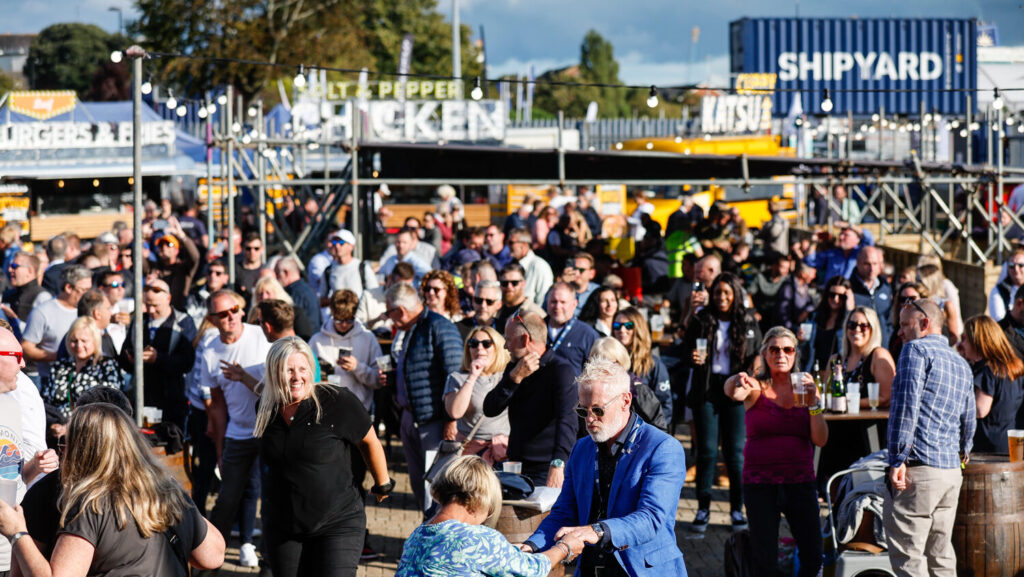 Southampton International Boat Show awards three-year F&B contract People dancing at a bustling SIBS 2023 F&B area