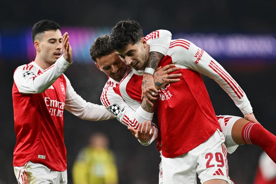 Kai Havertz of Arsenal celebrates scoring his team’s second goal with teammates Gabriel Martinelli and Ben White during the UEFA Champions League 2025/26 League Phase MD8 match between Arsenal FC and FC Kairat Almaty at Arsenal Stadium on January 28, 2026 in London, England.