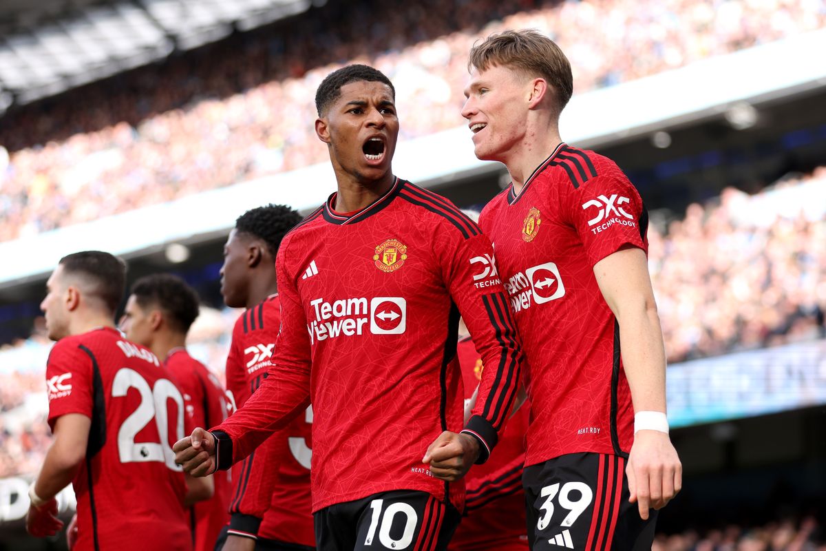 Marcus Rashford of Manchester United celebrates with Scott McTominay of Manchester United after scoring his team's first goal during the Premier League match between Manchester City and Manchester United at Etihad Stadium on March 03, 2024 in Manchester, England.