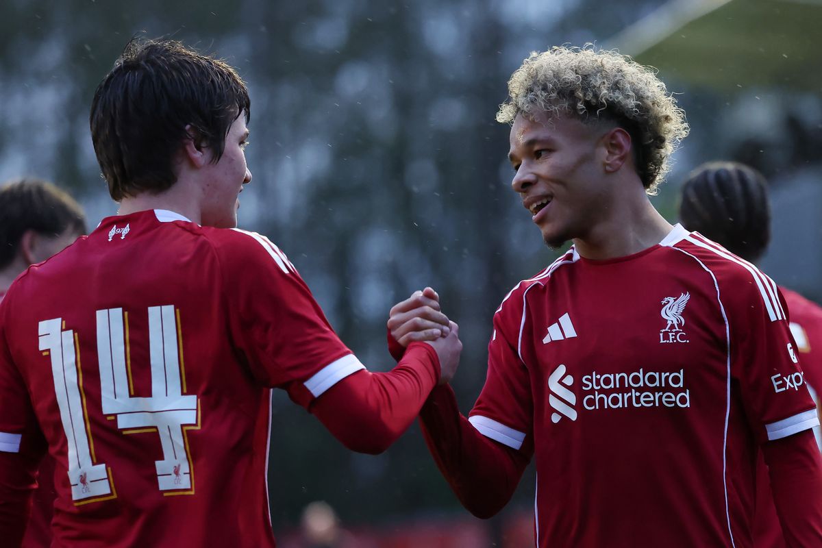 KIRKBY, ENGLAND - NOVEMBER 26: Trent Kone-Doherty of Liverpool celebrates scoring his team's first goal with teammate Haydn Murray-Holme during the UEFA Youth League 2025/26 League Phase MD5 match between Liverpool FC and PSV Eindhoven at Liverpool FC Academy on November 26, 2025 in Kirkby, England. (Photo by Annabel Lee-Ellis/Getty Images)