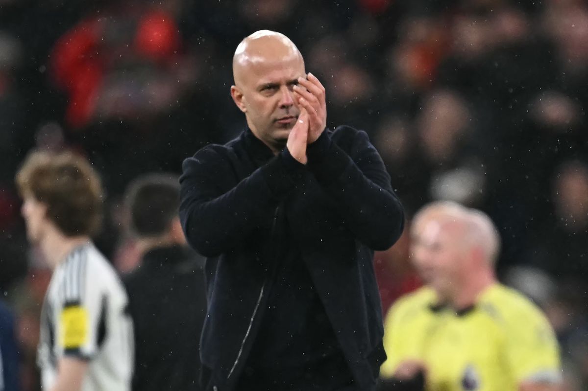Liverpool's Dutch manager Arne Slot applauds fans on the pitch after the English Premier League football match between Liverpool and Newcastle United at Anfield in Liverpool, north west England on January 31, 2026. Liverpool won the game 4-1.