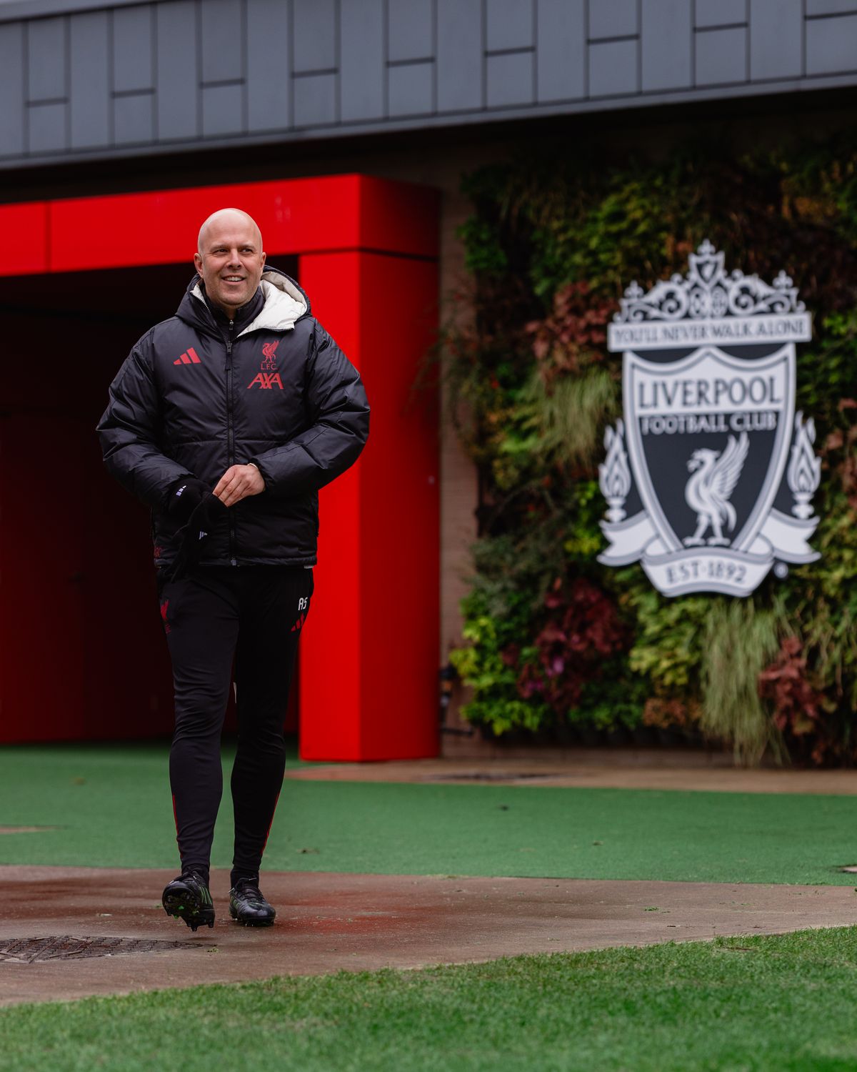 Arne Slot emerges for a Liverpool training session.