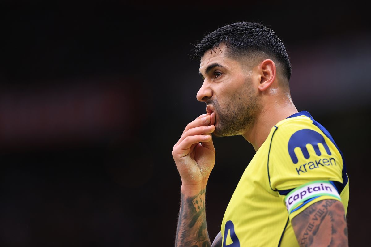 Cristian Romero after receiving a red card during the Premier League match between Manchester United and Tottenham Hotspur at Old Trafford
