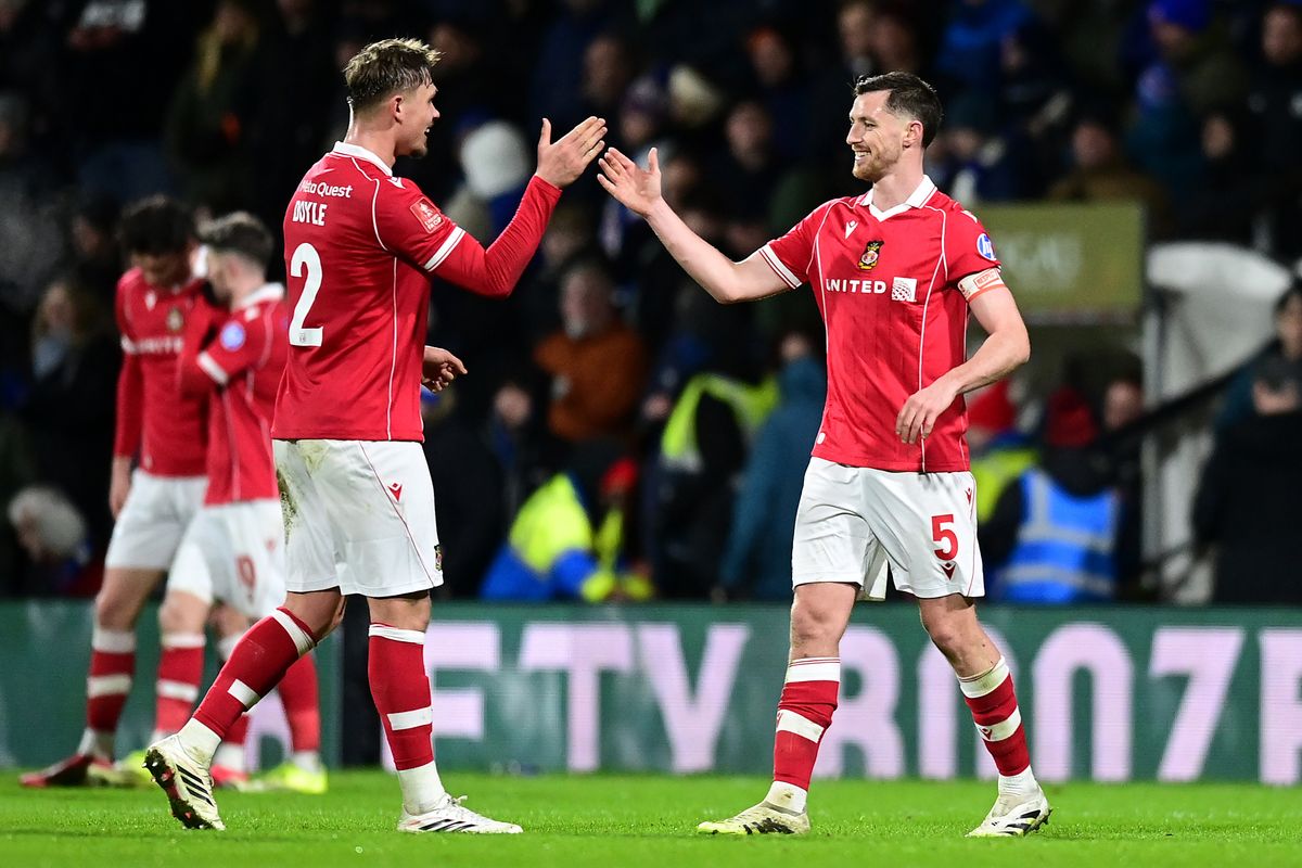 Dominic Hyam celebrates with team-mate Callum Doyle