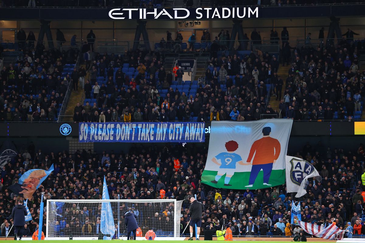 Fans of Manchester City put on a banner display during the Premier League match between City and Newcastle United at Etihad Stadium