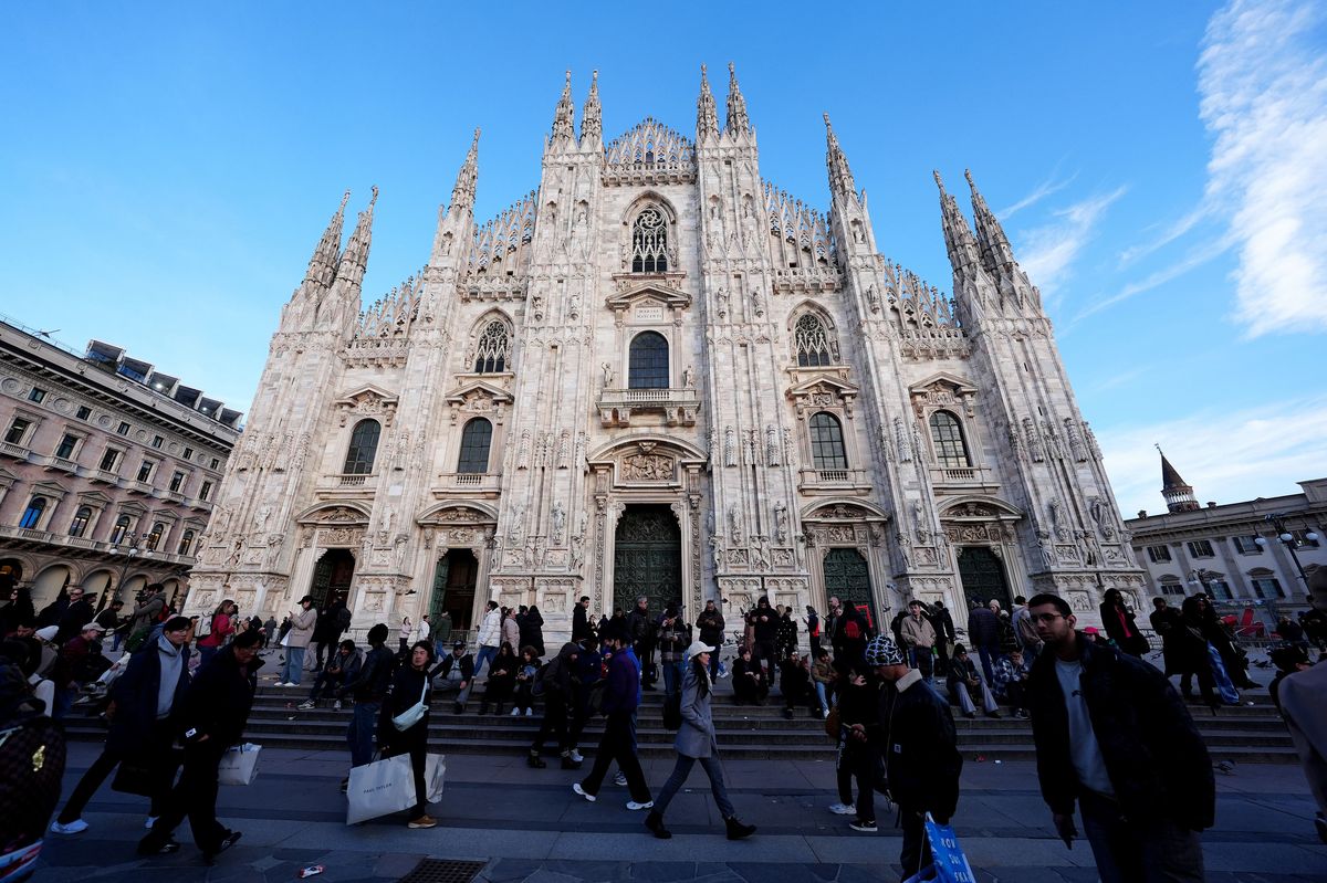 People gather outside Milan Cathedral