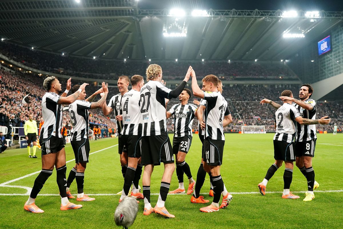 Newcastle players celebrate scoring against Athletic Club