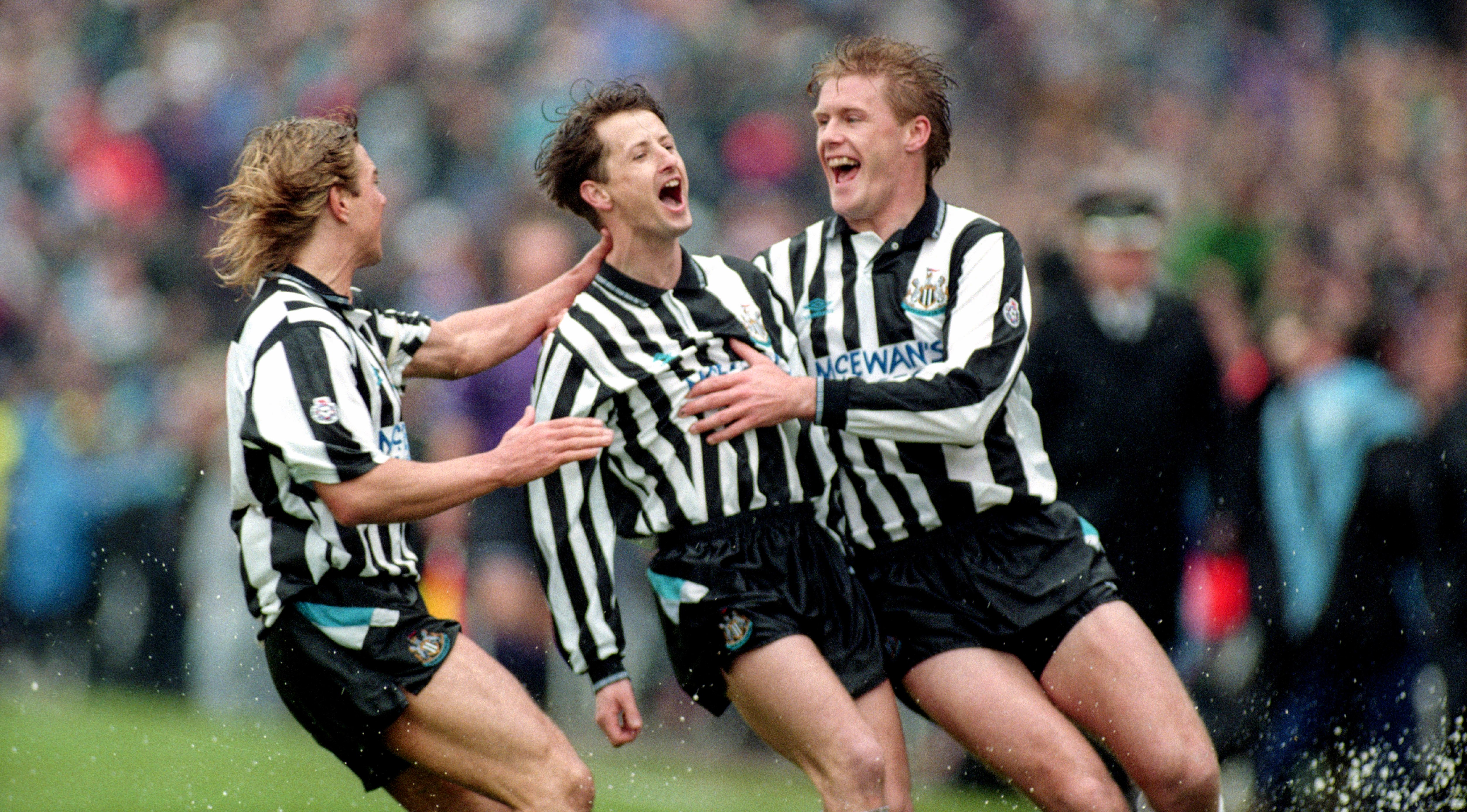 Newcastle United players Barry Venison, Kevin Scott, and Scott Sellars celebrating a goal.