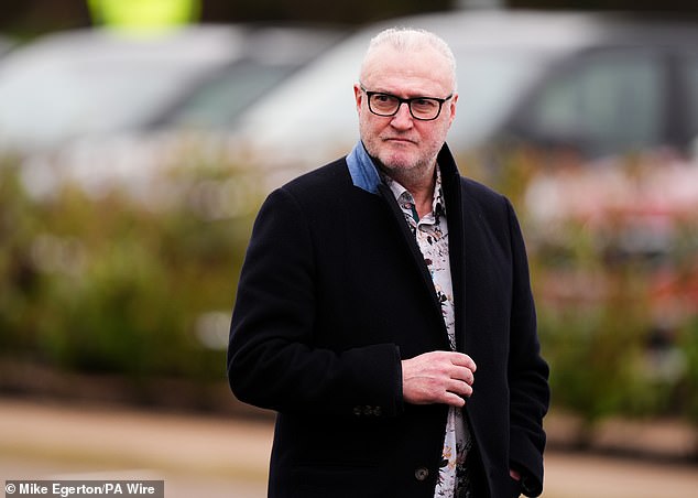 Garry Birtles, who called Robertson an 'absolute genius', is seen arriving at the crematorium