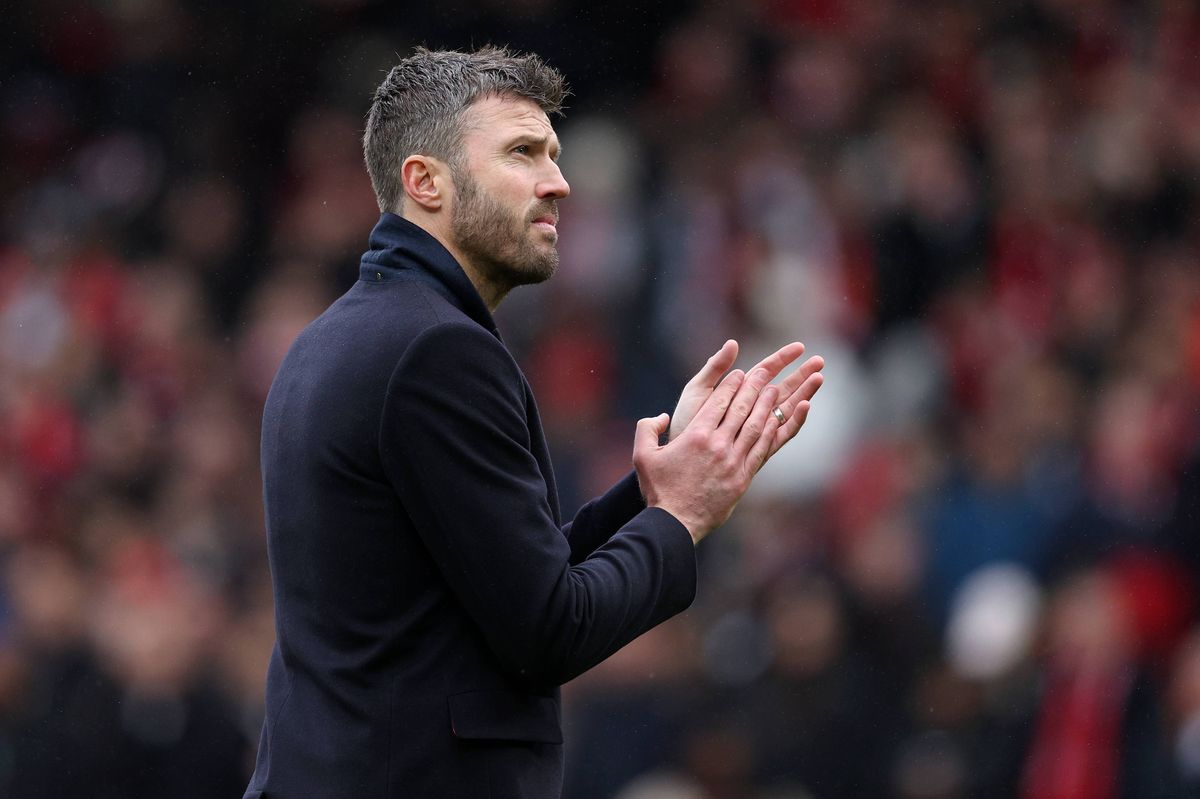 MANCHESTER, ENGLAND - FEBRUARY 7: Michael Carrick, Manager of Manchester United applauds the fans after winning the Premier League match between Manchester United and Tottenham Hotspur at Old Trafford on February 7, 2026 in Manchester, England. (Photo by Neal Simpson/Sportsphoto/Allstar via Getty Images)