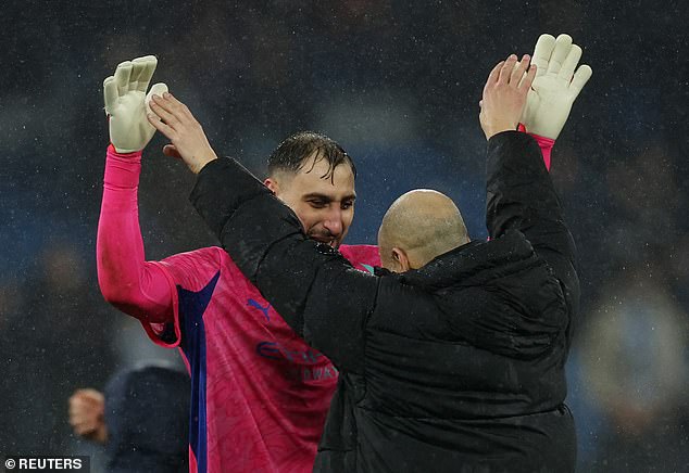 Man City paid £26million to sign Donnarumma (pictured with Pep Guardiola) on deadline day