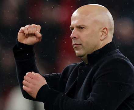 Liverpool manager Arne Slot celebrates after the match