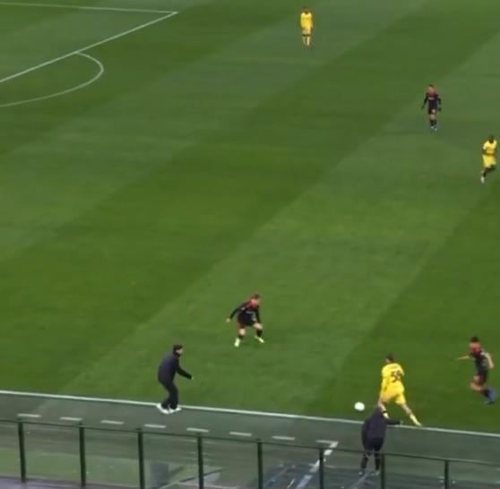 Fábregas pulling Saelemakers shirt.