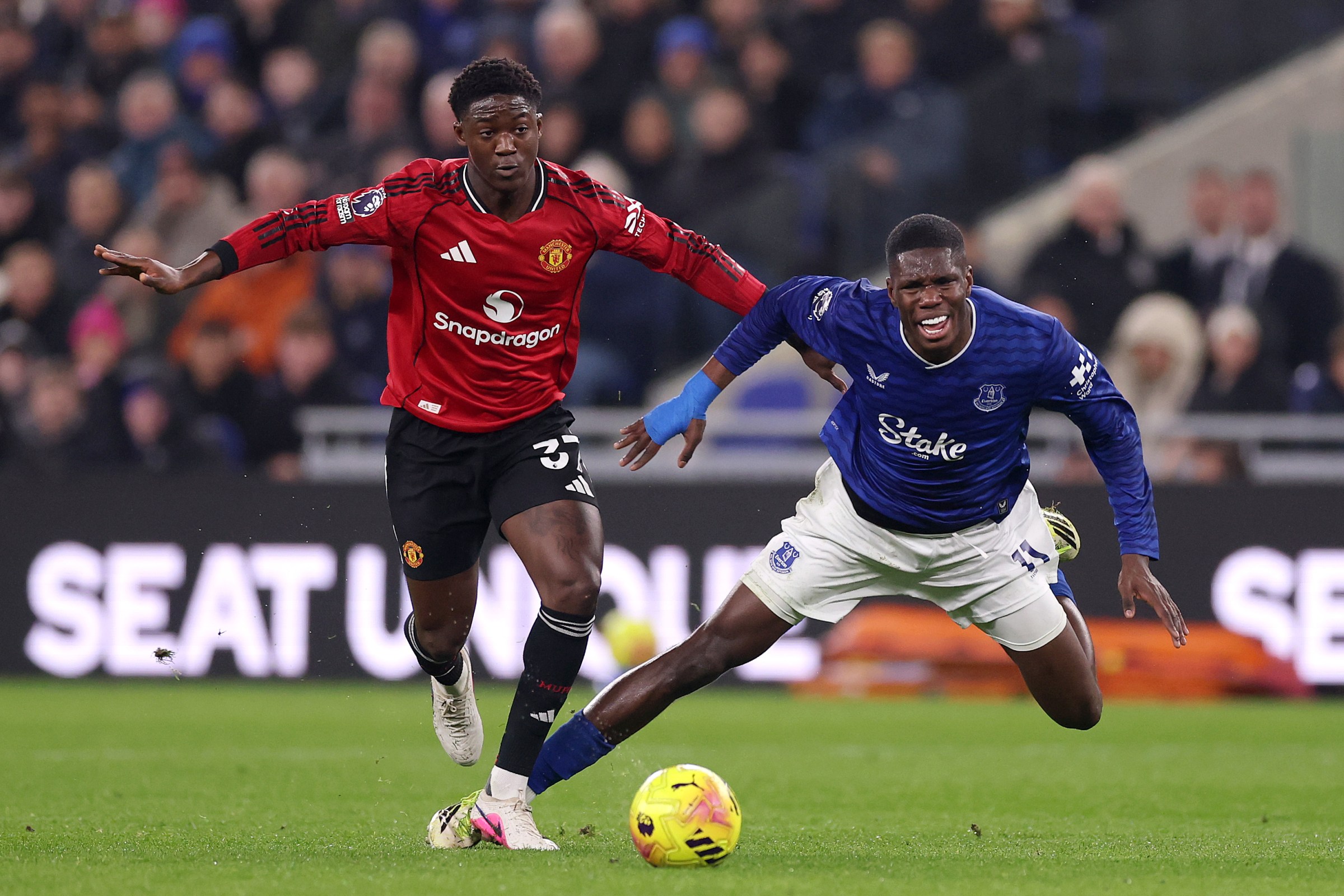 Thierno Barry of Everton is fouled by Kobbie Mainoo. {Getty Images)
