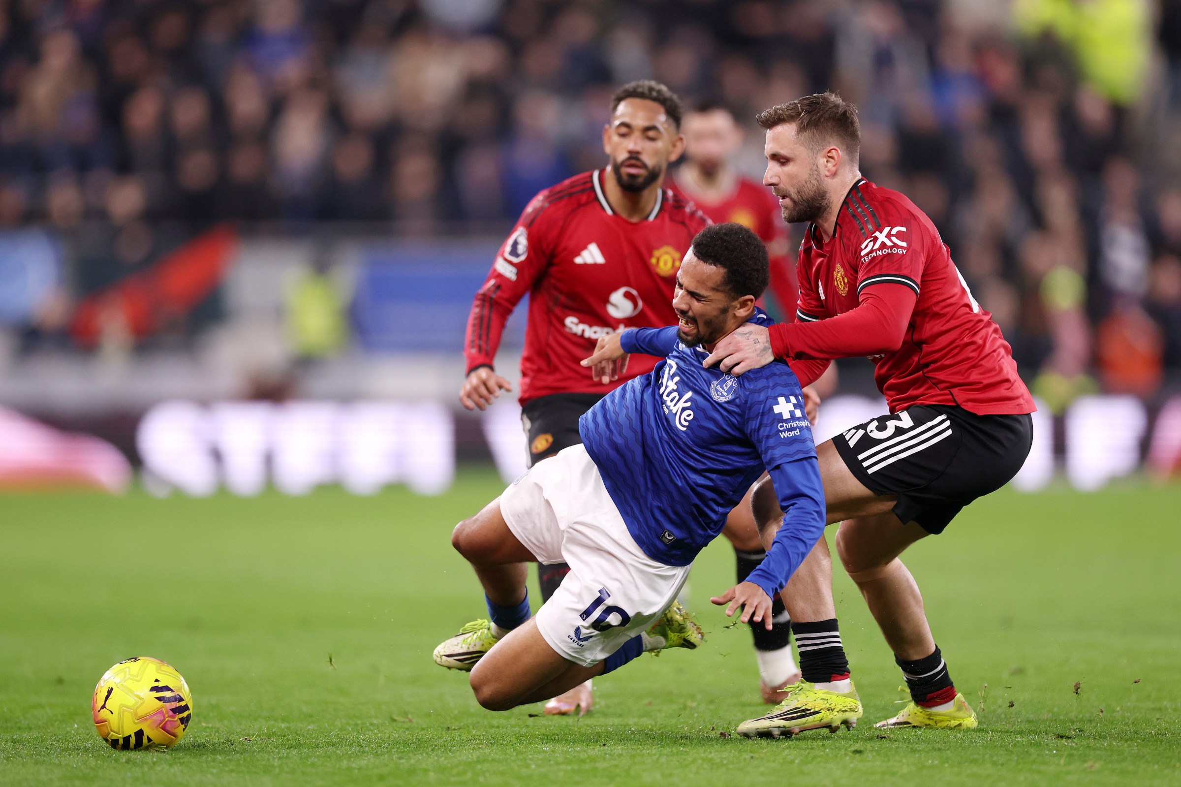 Iliman Ndiaye of Everton is challenged by Luke Shaw. (Getty Images)