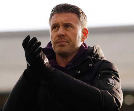 Wolverhampton Wanderers manager Rob Edwards applauds fans after the match 