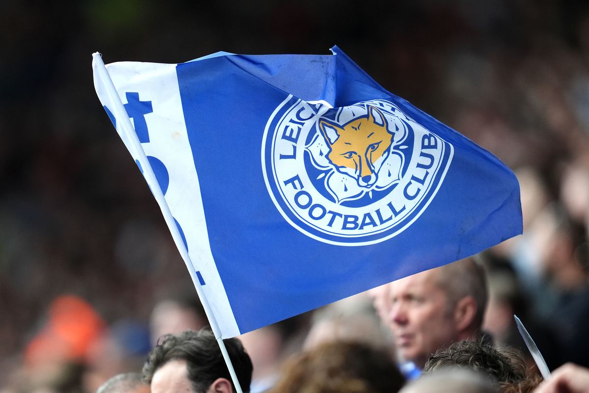 A Leicester City flag flying at the King Power Stadium