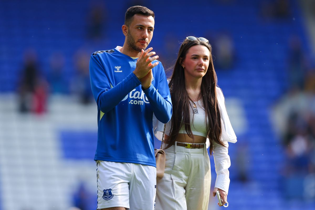 Dwight McNeil partakes in a lap of appreciation with partner Megan Sharpley after the Premier League match between Everton FC and Sheffield United at Goodison Park on May 11, 2024. Photo by James Gill - Danehouse/Getty Images