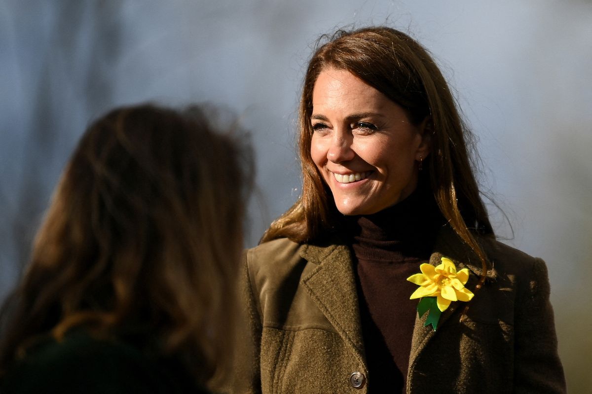 Britain's Catherine, Princess of Wales smiles during a visit to Meadow Street Community Garden and Woodland in Pontypridd, south Wales on February 26, 2025