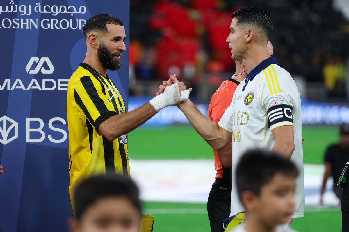 JEDDAH, SAUDI ARABIA - SEPTEMBER 26: Karim Benzema of Al Ittihad and Cristiano Ronaldo of Al Nassr prior the Saudi Pro League match between Al Ittihad and Al Nassr at King Abdullah Sports City on September 26, 2025 in Jeddah, Saudi Arabia. (Photo by Yasser Bakhsh/Getty Images)