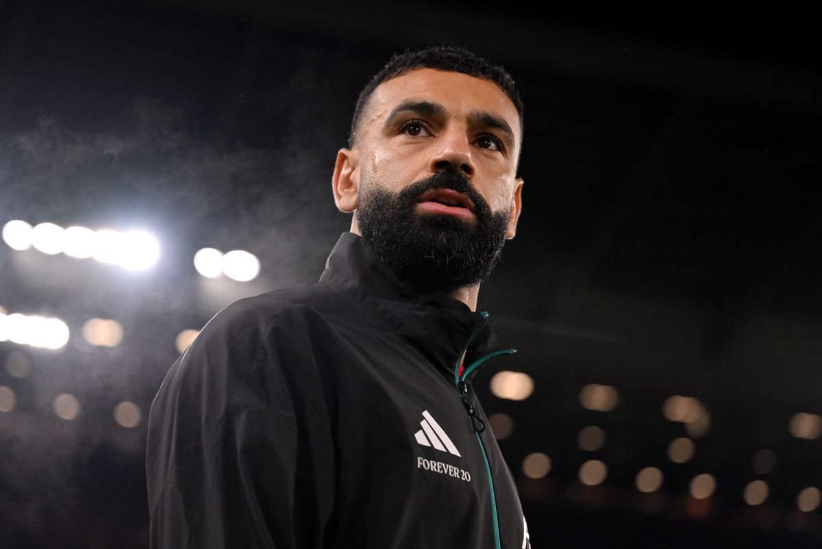 Mohamed Salah walks out before a Liverpool game