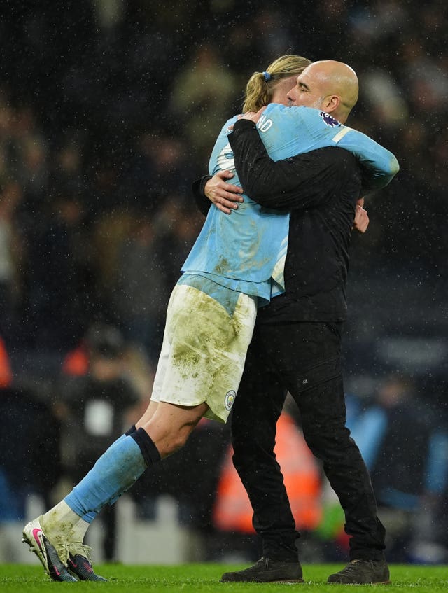 Manchester City’s Erling Haaland and manager Pep Guardiola at the final whistle against Newcastle
