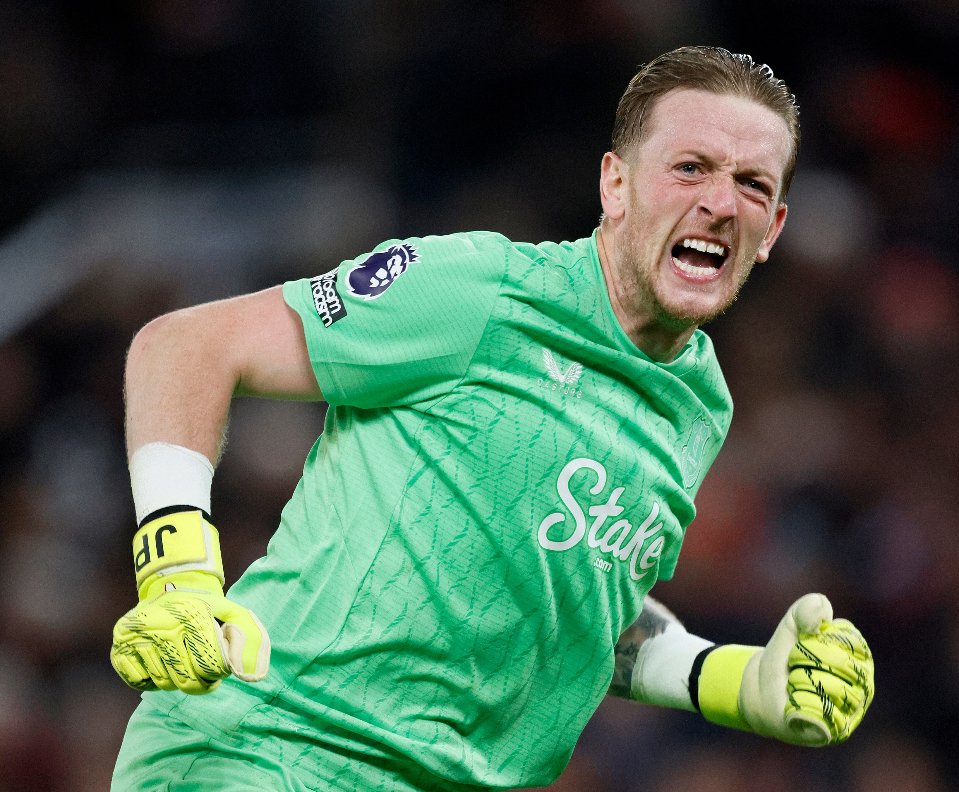 Jordan Pickford, Everton's goalkeeper, celebrates after the Premier League match against Manchester United.