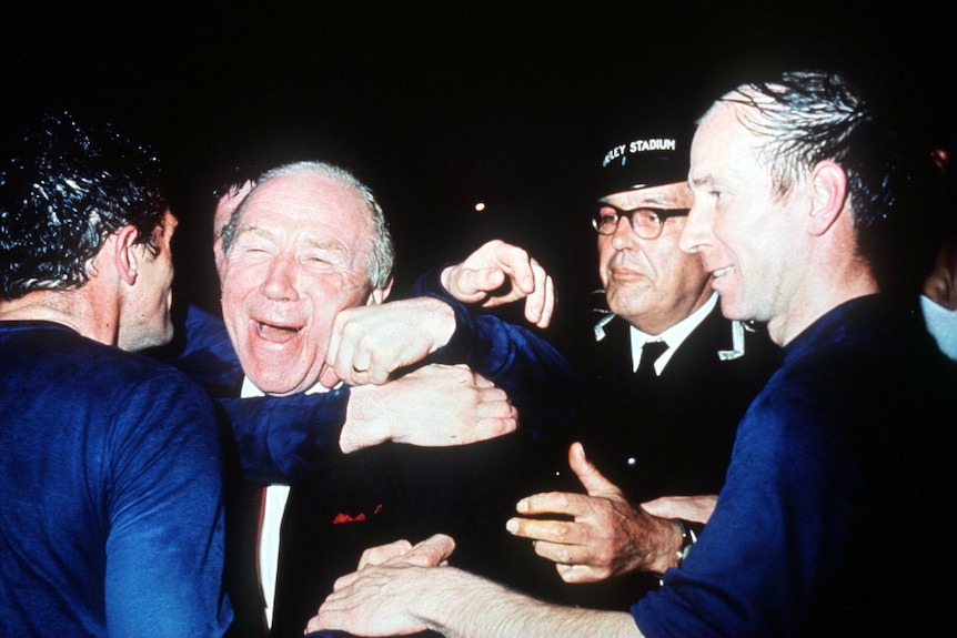 Matt Busby and Bobby Charlton celebrate