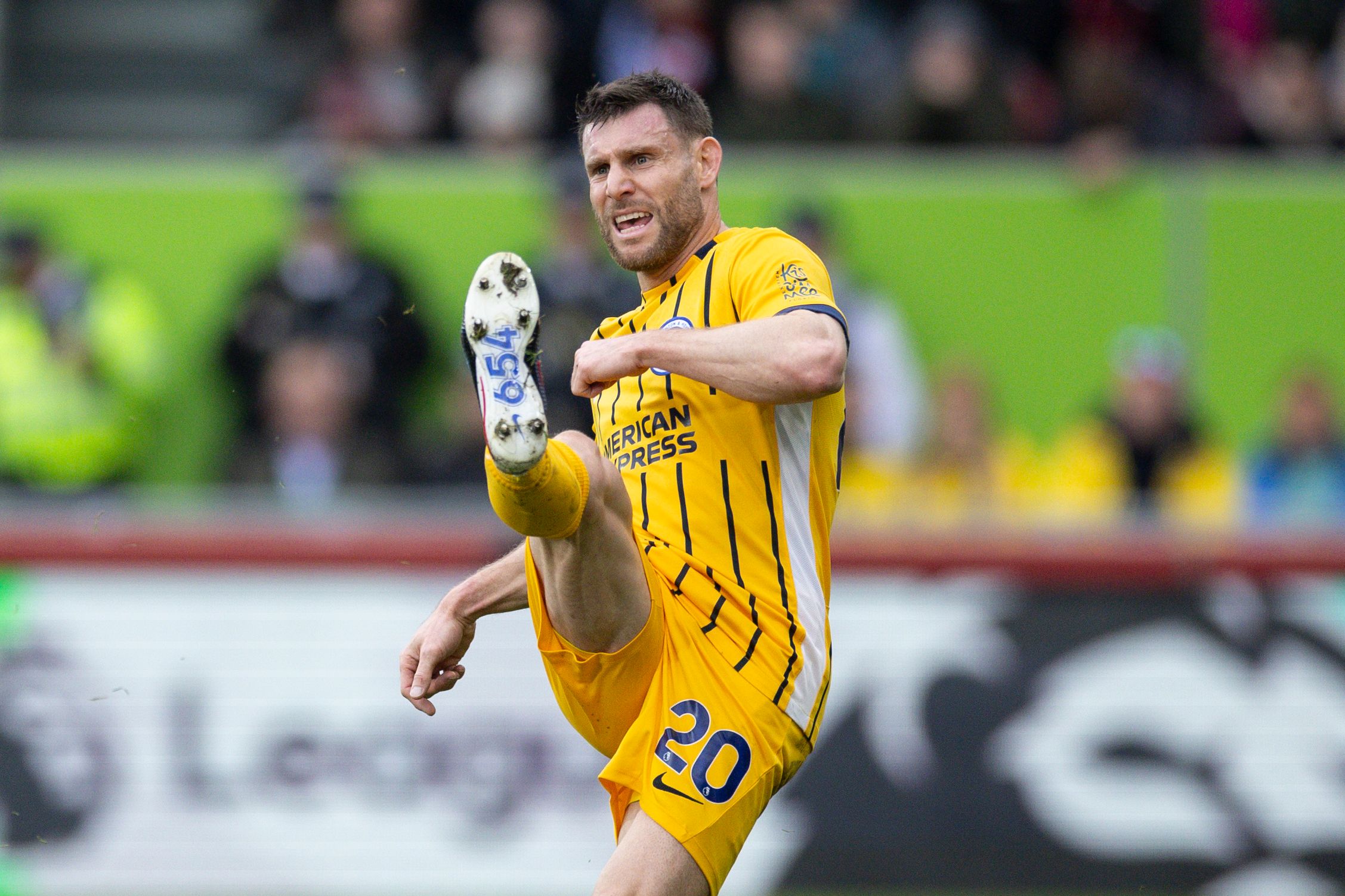 James Milner of Brighton & Hove Albion with "654" on the bottom of his boot, marking his record 654th Premier League appearance.