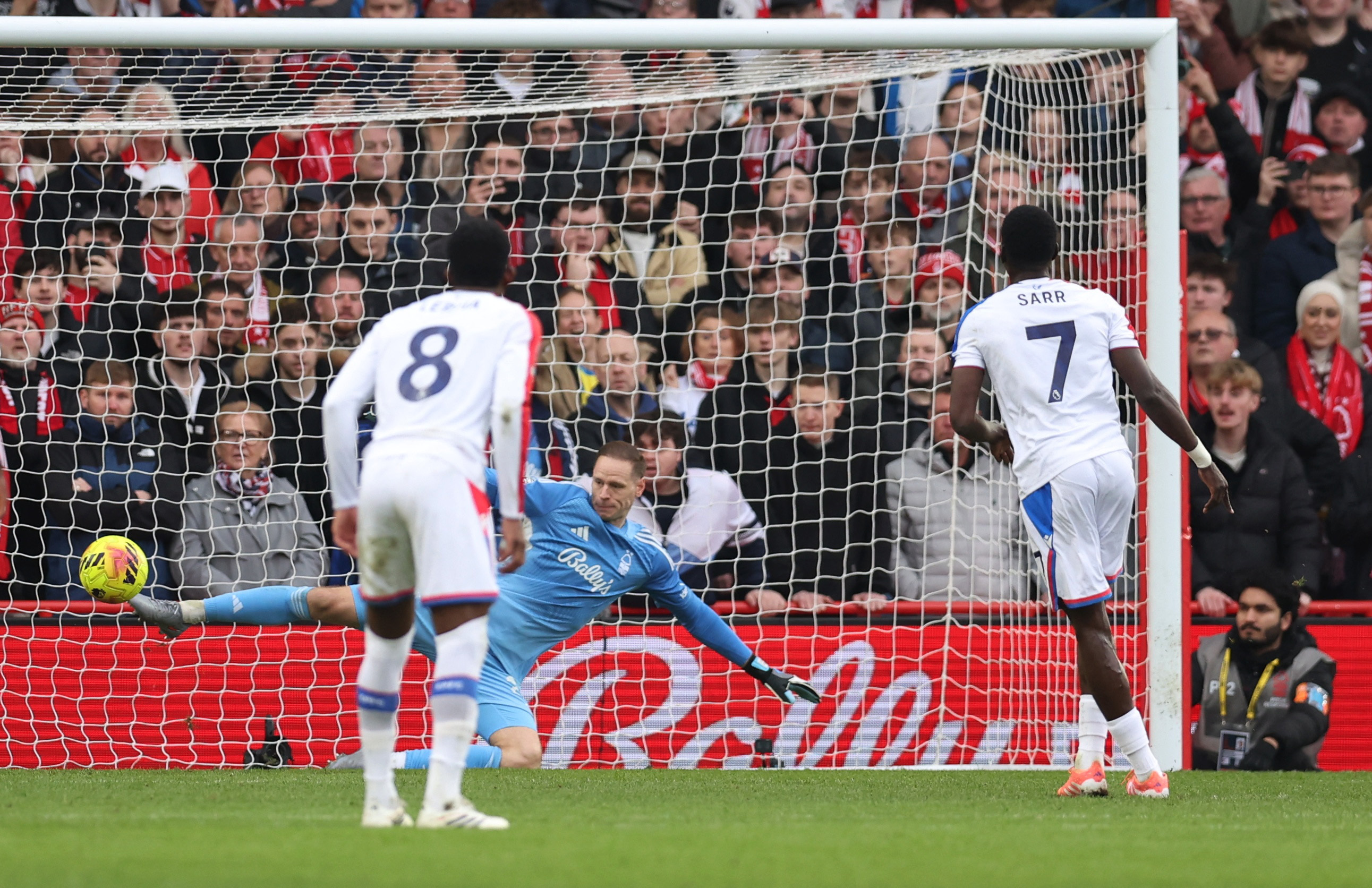 Ismaila Sarr scores Crystal Palace's first goal past Nottingham Forest's Matz Sels.