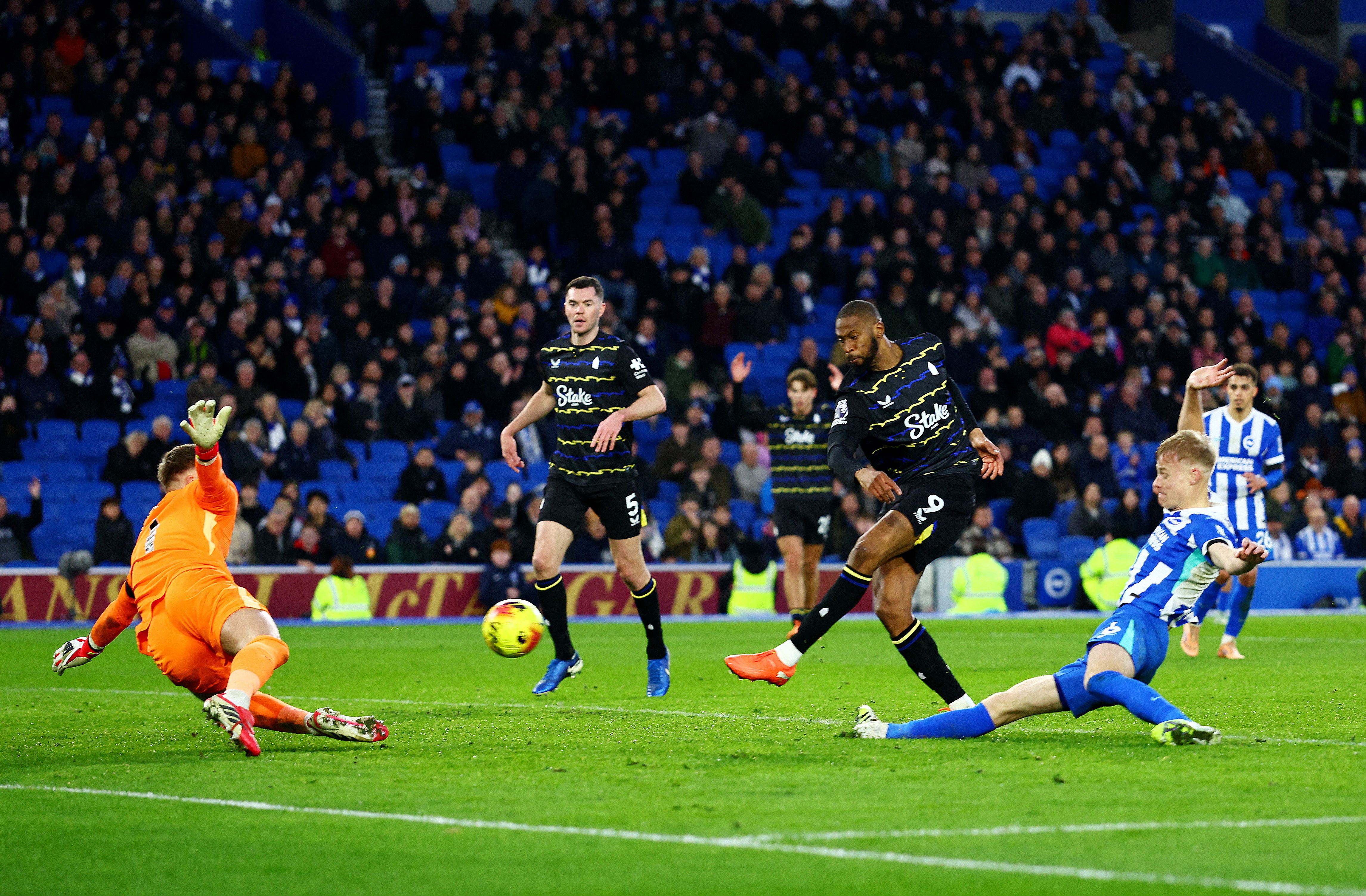 Beto of Everton scores a goal against Brighton and Hove Albion.