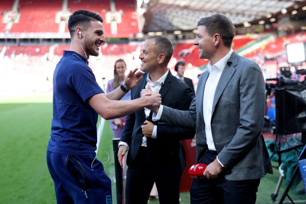 Declan Rice greets Steven Gerrard before England's UEFA European Championship Qualifier against North Macedonia at Old Trafford